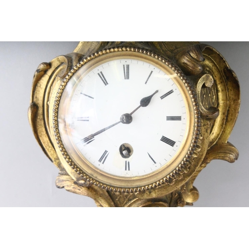 1191 - A SMALL 19TH CENTURY FRENCH LOUIS XVI DESIGN CARTEL CLOCK in an acanthus scrolled frame. 9ins long.... 