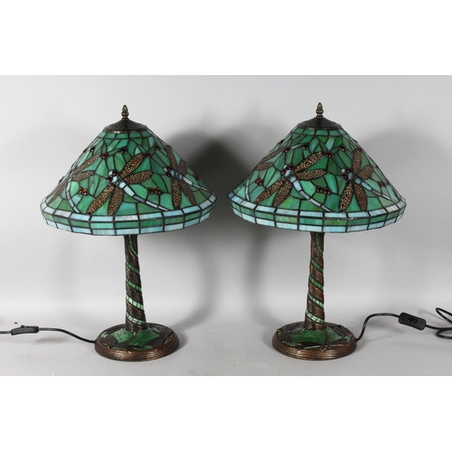 1331 - A GOOD PAIR OF TIFFANY DESIGN GREEN DRAGONFLY LAMPS. 22ins high.