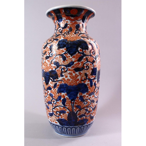 10 - A JAPANESE MEIJI PERIOD IMARI PORCELAIN VASE, decorated with scrolling native flora in typical imari... 