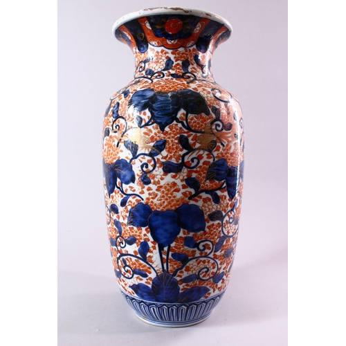 10 - A JAPANESE MEIJI PERIOD IMARI PORCELAIN VASE, decorated with scrolling native flora in typical imari... 