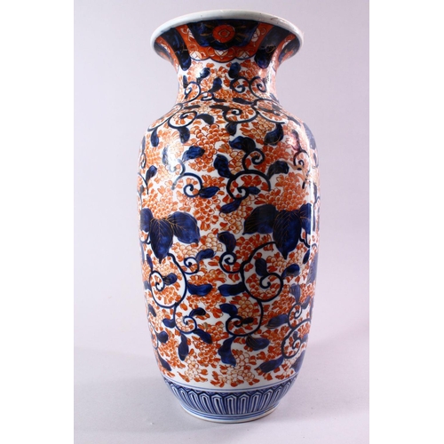 10 - A JAPANESE MEIJI PERIOD IMARI PORCELAIN VASE, decorated with scrolling native flora in typical imari... 