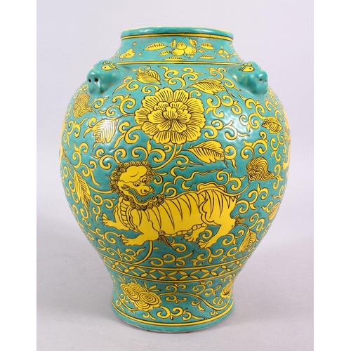 100 - A CHINESE MING STYLE TURQUOISE GROUND PORCELAIN KYLIN VASE, decorated with a turquoise ground with y... 