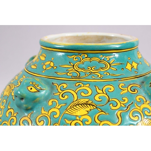 100 - A CHINESE MING STYLE TURQUOISE GROUND PORCELAIN KYLIN VASE, decorated with a turquoise ground with y... 