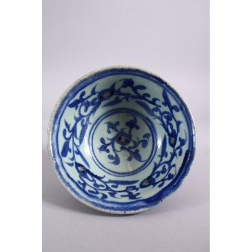 103 - A CHINESE BLUE & WHITE PORCELAIN STEM CUP - FOR THE ISLAMIC MARKET, decorated with scrolling flora w... 