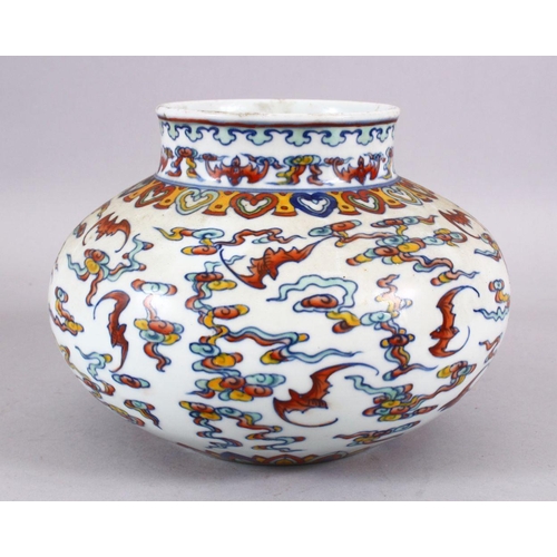 106 - A CHINESE WUCAI DECORATED PORCELAIN JAR - decorated with bats amongst stylized clouds, with ruyi bor... 