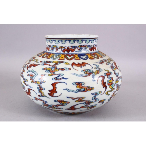 106 - A CHINESE WUCAI DECORATED PORCELAIN JAR - decorated with bats amongst stylized clouds, with ruyi bor... 