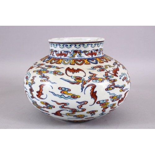 106 - A CHINESE WUCAI DECORATED PORCELAIN JAR - decorated with bats amongst stylized clouds, with ruyi bor... 