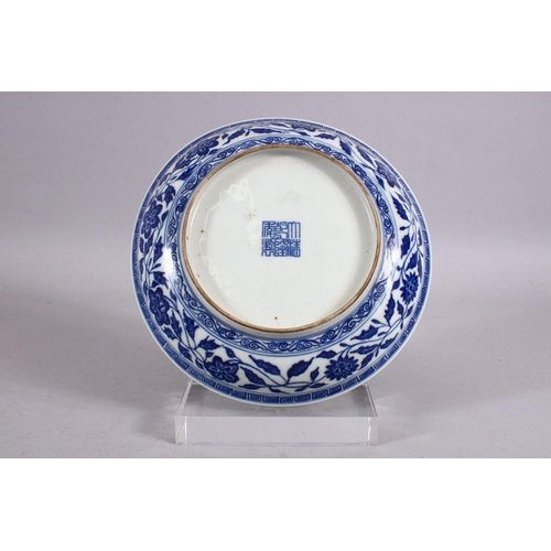 107 - A CHINESE BLUE & WHITE LOTUS BOUQUET PORCELAIN DISH, decorated with a display of lotus, with surroun... 