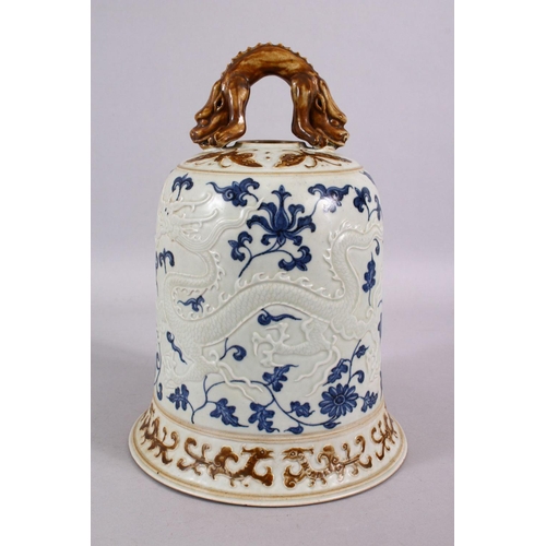 108 - A CHINESE BLUE, WHITE & BISCUIT MING STYLE DRAGON PORCELAIN TEMPLE BELL, the body with moulded relie... 