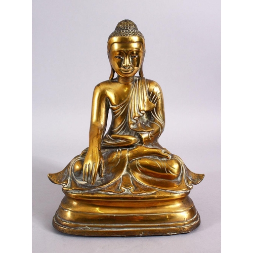 112 - A GOOD 19TH CENTURY SINO TIBETAN BRONZE SEATED BUDDHA, in a seated meditation position with his legs... 