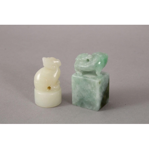 116 - TWO 19TH / 20TH CENTURY CHINESE CARVED JADE / JADEITE SEALS, one white jade depicting a kylin, the u... 