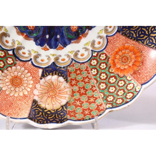 12 - A PAIR OF JAPANESE MEIJI PERIOD IMARI PORCELAIN CHRYSANTHEMUM FORMED PLATES, each decorated with flo... 