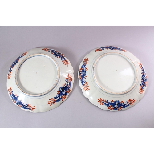 12 - A PAIR OF JAPANESE MEIJI PERIOD IMARI PORCELAIN CHRYSANTHEMUM FORMED PLATES, each decorated with flo... 