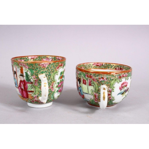 124 - A 19TH CENTURY CHINESE FAMILLE ROSE CANTON CUPS & SAUCER, decorated with panels of birds and flora &... 