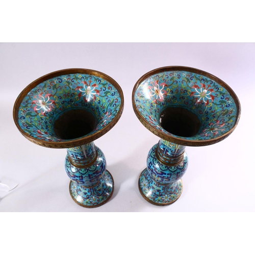 133 - A GOOD PAIR OF 19TH CENTURY CHINESE CLOISONNE GU FORM VASES, on pale blue ground with stylised motif... 