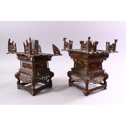 136 - A MATCHED PAIR OF 19TH CENTURY CHINESE SPELTER PAGODA FORM CANDLE STANDS, with cast and pierced deco... 