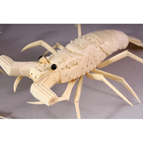 146 - A PAIR OF JAPANESE 20TH CENTURY CARVED BONE MODELS OF CRAYFISH, 30cm long.