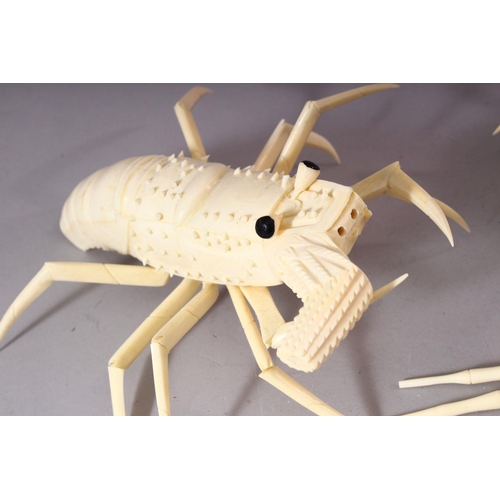 146 - A PAIR OF JAPANESE 20TH CENTURY CARVED BONE MODELS OF CRAYFISH, 30cm long.