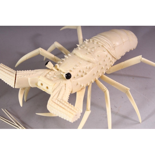 147 - A PAIR OF JAPANESE 20TH CENTURY CARVED BONE MODELS OF CRAYFISH, 30cm long.