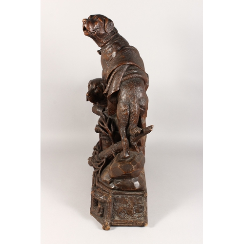 1195A - A VERY GOOD ANTIQUE BLACK FOREST CLOCK CARVED WITH TWO SAINT BERNARD DOGS, one with a bell around hi... 