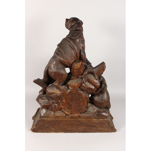 1195A - A VERY GOOD ANTIQUE BLACK FOREST CLOCK CARVED WITH TWO SAINT BERNARD DOGS, one with a bell around hi... 