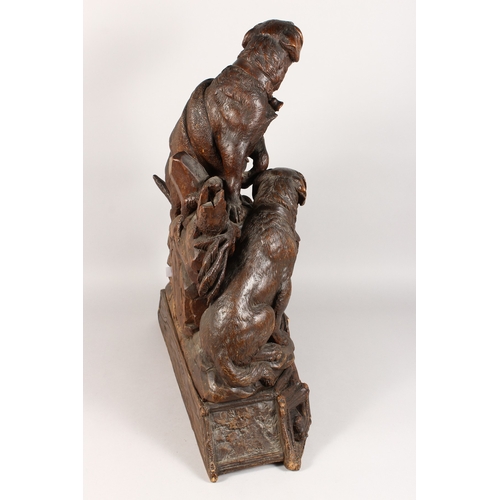 1195A - A VERY GOOD ANTIQUE BLACK FOREST CLOCK CARVED WITH TWO SAINT BERNARD DOGS, one with a bell around hi... 