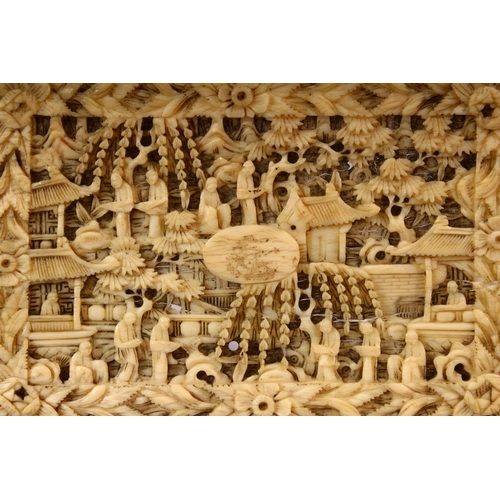 149 - A 19TH CENTURY CANTON IVORY CARVED RECTANGULAR PANEL, depicting figures amongst and landscape settin... 