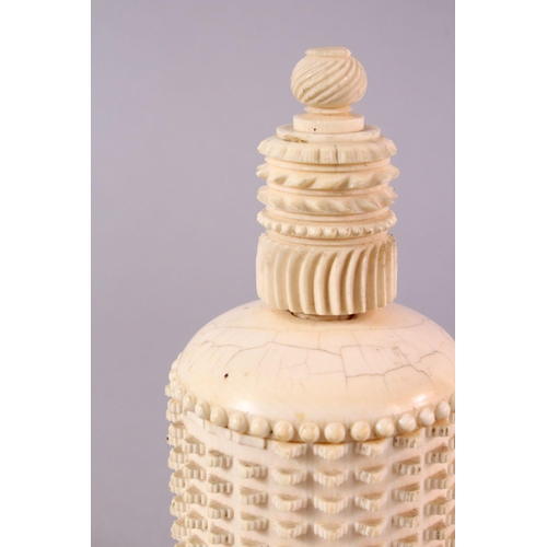 150 - A 19TH CENTURY CARVED IVORY CYLINDRICAL BOX AND COVER - the cover possibly a marriage, 15cm.