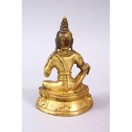 155 - A GOOD CHINESE QING DYNASTY GILT BRONZE FIGURE OF BUDDHA, in a seated position upon a lotus form bas... 