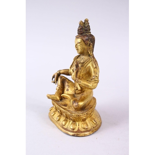 155 - A GOOD CHINESE QING DYNASTY GILT BRONZE FIGURE OF BUDDHA, in a seated position upon a lotus form bas... 