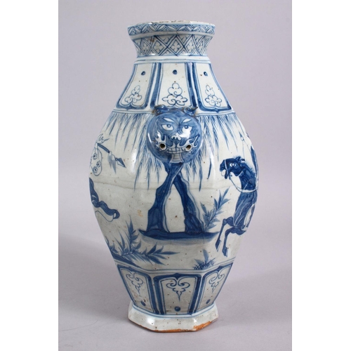 160 - A CHINESE YAN STYLE BLUE & WHITE TWIN HANDLE PORCELAIN VASE, decorated with scenes of a warrior upon... 