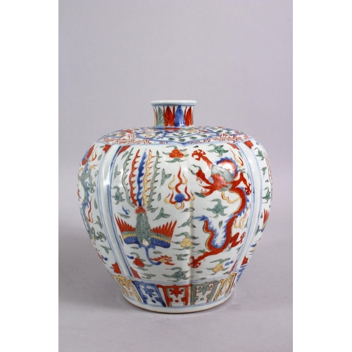 165 - A CHINESE MING STYLE JIAJING STYLE WUCAI PORCELAIN VASE, decorated in wucai palate depicting panels ... 