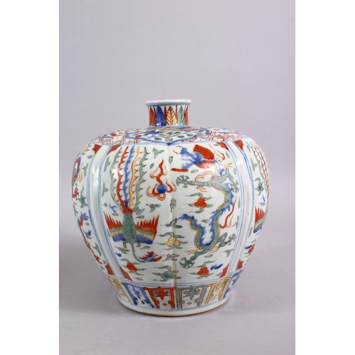 165 - A CHINESE MING STYLE JIAJING STYLE WUCAI PORCELAIN VASE, decorated in wucai palate depicting panels ... 