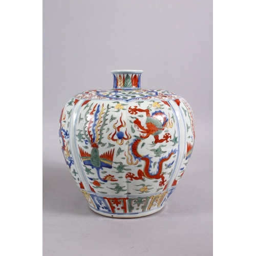 165 - A CHINESE MING STYLE JIAJING STYLE WUCAI PORCELAIN VASE, decorated in wucai palate depicting panels ... 