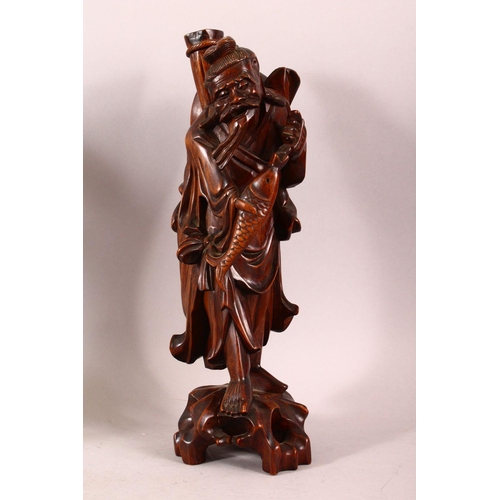 179 - A PAIR OF CHINESE CARVED 'ROOTWOOD' FIGURES of fisherman, 35cm high.