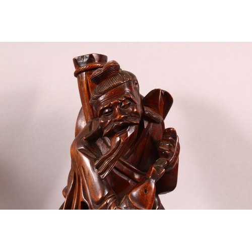 179 - A PAIR OF CHINESE CARVED 'ROOTWOOD' FIGURES of fisherman, 35cm high.