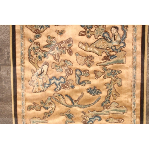 186 - A MID 20TH CENTURY OR EARLIER CHINESE SILKWORK PICTURE depicting figures and trees, framed and glaze... 