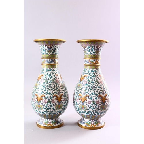 192 - A PAIR OF CHINESE CLOISONNE BALUSTER SHAPE VASES, with floral sprays and lotus flowers, 31cm.