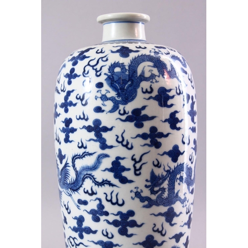 195 - A GOOD CHINESE BLUE AND WHITE VASE, painted all over with dragons and phoenix amongst clouds, collec... 