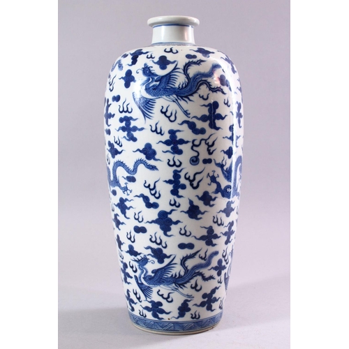 195 - A GOOD CHINESE BLUE AND WHITE VASE, painted all over with dragons and phoenix amongst clouds, collec... 