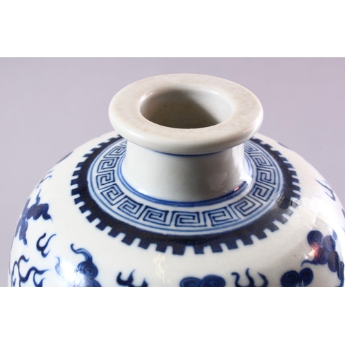 195 - A GOOD CHINESE BLUE AND WHITE VASE, painted all over with dragons and phoenix amongst clouds, collec... 