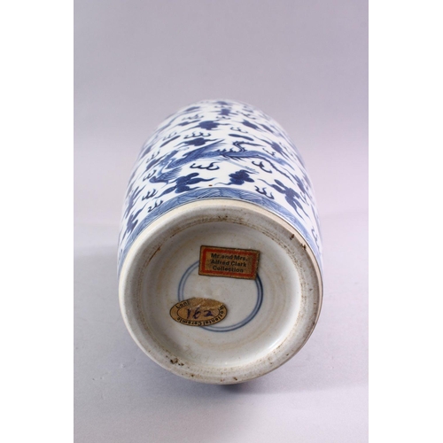 195 - A GOOD CHINESE BLUE AND WHITE VASE, painted all over with dragons and phoenix amongst clouds, collec... 