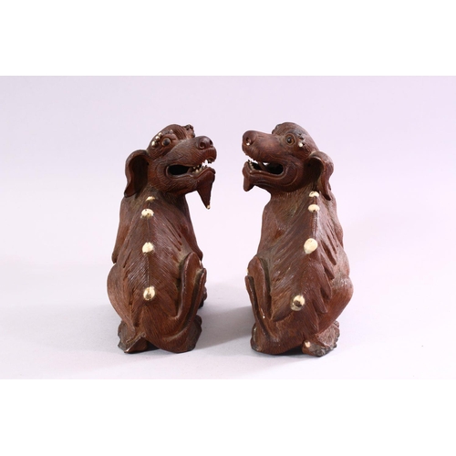 202 - A GOOD PAIR OF CHINESE 19TH CENTURY TERRACOTTA FORMED LION DOG FIGURES, Modeled as male and female, ... 