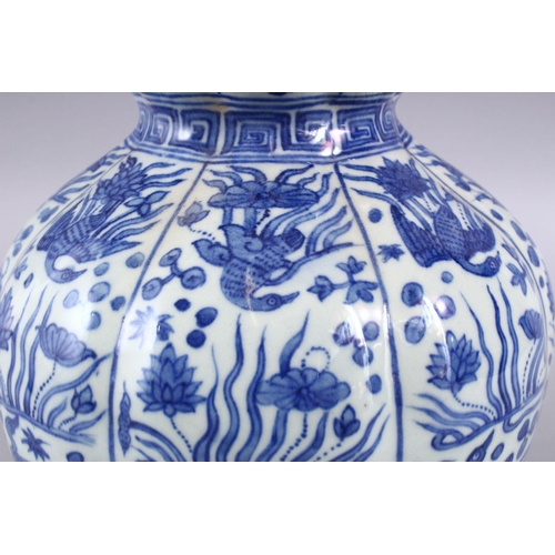 209 - A CHINESE MING STYLE BLUE & WHITE DOUBLE GOURD, with a ribbed section body, with scenes of phoenix a... 