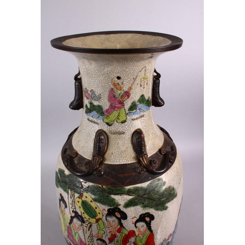 211 - A LARGE CHINESE 19TH / 20TH CENTURY FAMILLE ROSE CRACKLEWARE PORCELAIN VASE, decorated with scenes o... 