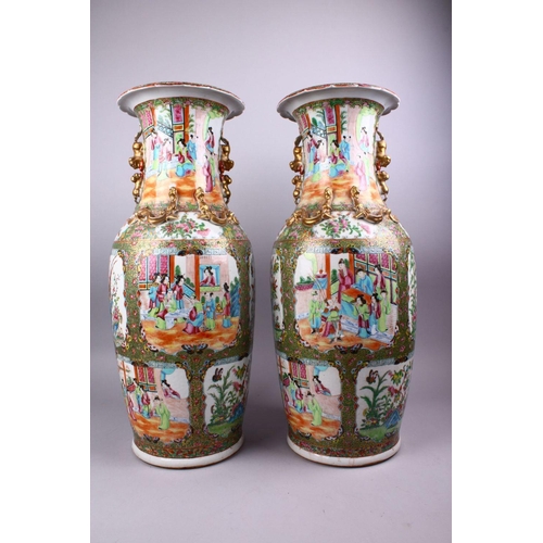 222 - A GOOD LARGE PAIR OF 19TH CENTURY CHINESE CANTON FAMILLE ROSE PORCELAIN VASES, decorated with panels... 