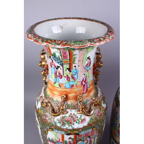 222 - A GOOD LARGE PAIR OF 19TH CENTURY CHINESE CANTON FAMILLE ROSE PORCELAIN VASES, decorated with panels... 