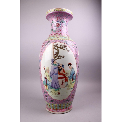 223 - A LARGE CHINESE REPUBLIC STYLE FAMILLE ROSE PORCELAIN VASE, with a pink ground  and panles depicting... 