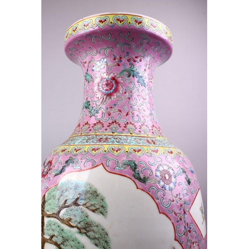 223 - A LARGE CHINESE REPUBLIC STYLE FAMILLE ROSE PORCELAIN VASE, with a pink ground  and panles depicting... 