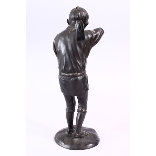 232 - A JAPANESE MEIJI PERIOD BRONZE OKIMONO - SMOKING MAN, the figure stood upon stylized base, holding h... 